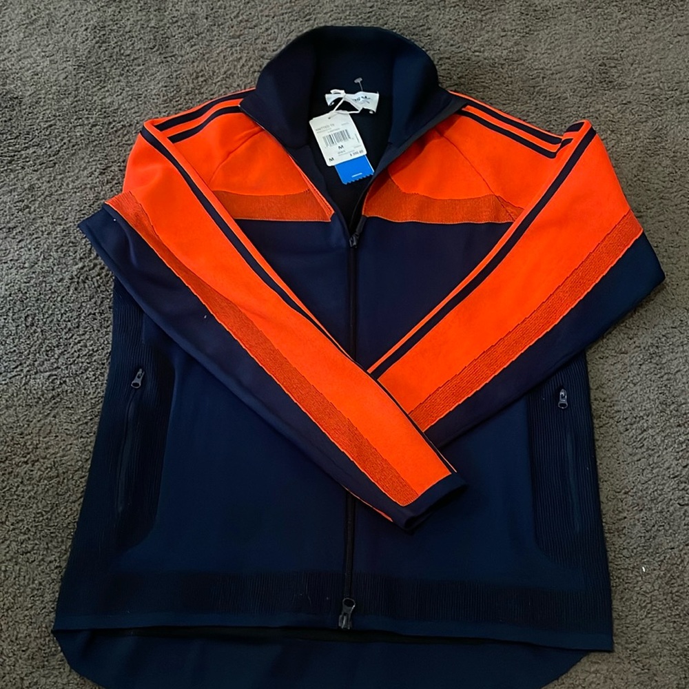 Men’s Adidas soccer jacket. Size M